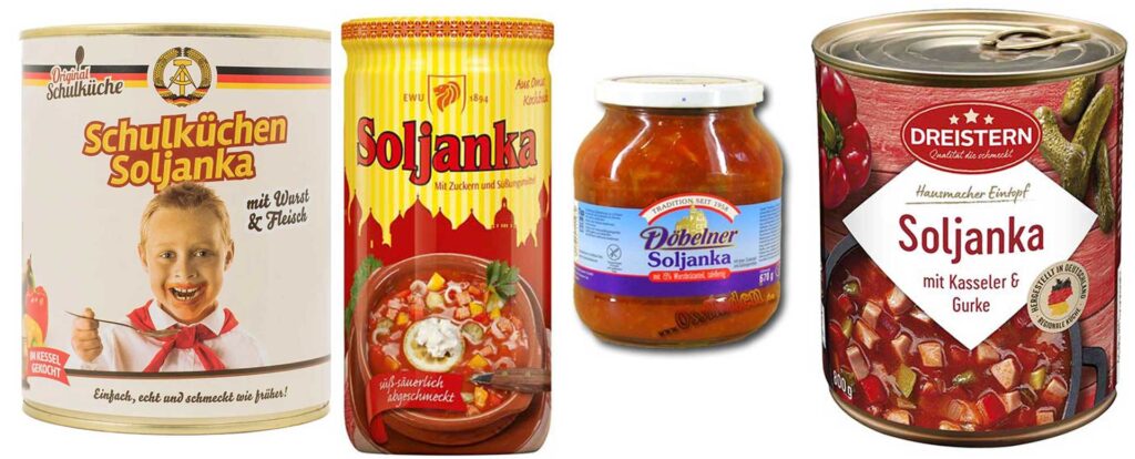 Dosen und Gläser gefüllt mit Soljanka.